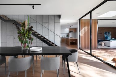 Modern home interior design showcasing staircase and open living space